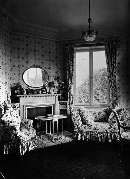 Boudoir. circa 1900: Interior of a turn of the century bedroom