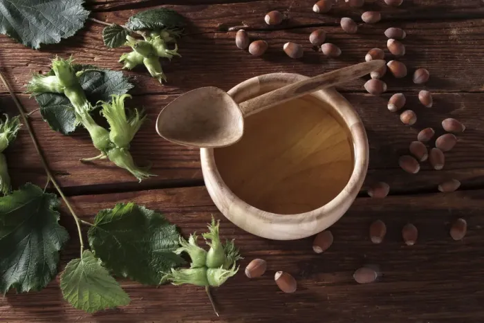 Framed Print : A bowl of hazelnut oil and some ripe and unripe hazelnuts (Corylus avellana) on rustic wooden boards Framed Print : A bowl of hazelnut oil and some ripe and unripe hazelnuts (Corylus avellana) on rustic wooden boards