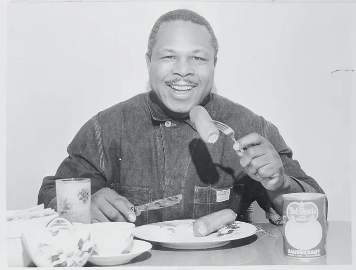 Framed Print : Boxer Archie Moore Eating German Meal Framed Print : Boxer Archie Moore Eating German Meal