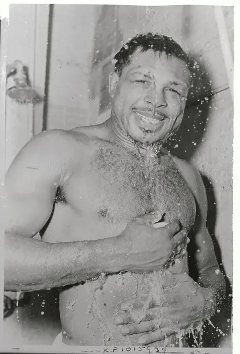 Framed Print : Boxer Archie Moore Taking a Shower Framed Print : Boxer Archie Moore Taking a Shower