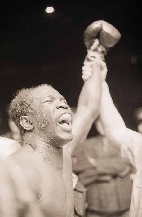 Framed Print : Boxer with Arm Raised in Victory Framed Print : Boxer with Arm Raised in Victory