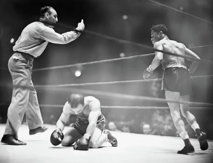 Framed Print : Boxer Kneeling on Canvas After Knock Out Framed Print : Boxer Kneeling on Canvas After Knock Out