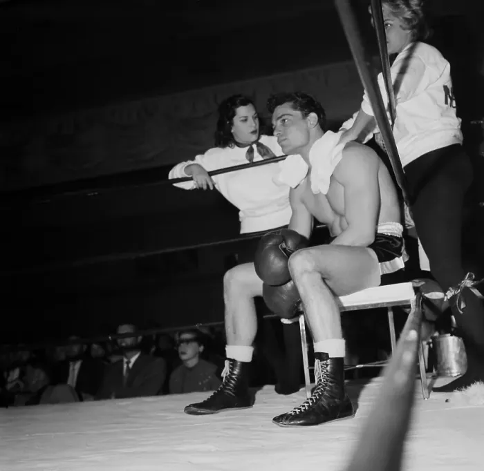 Framed Print : Boxing. LOS ANGELES, CA - CIRCA 1957: A view of two women help support Framed Print : Boxing. LOS ANGELES, CA - CIRCA 1957: A view of two women help support