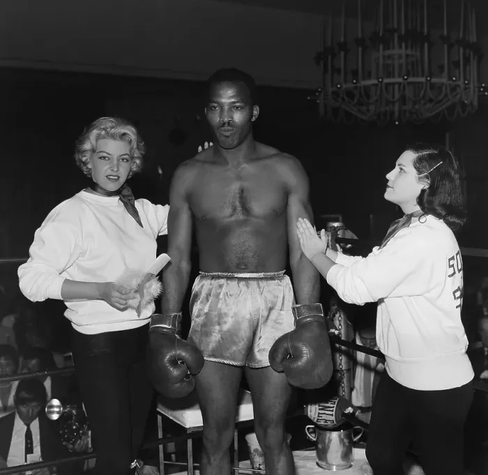 Framed Print : Boxing. LOS ANGELES, CA - CIRCA 1957: A view of two women support a boxer Framed Print : Boxing. LOS ANGELES, CA - CIRCA 1957: A view of two women support a boxer