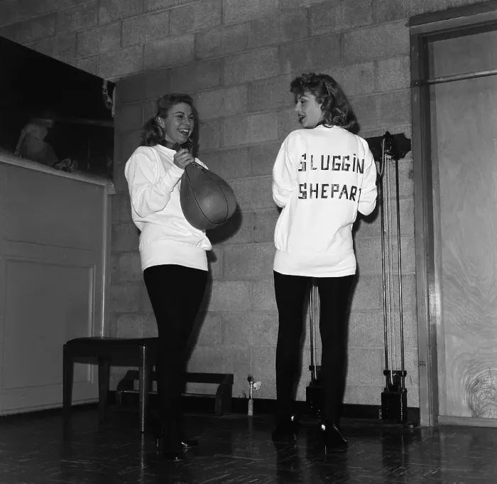 Framed Print : Boxing. LOS ANGELES, CA - CIRCA 1957: Two women in a boxing gym help prepare Framed Print : Boxing. LOS ANGELES, CA - CIRCA 1957: Two women in a boxing gym help prepare