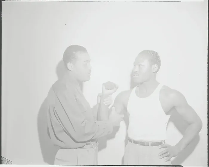 Framed Print : Boxing Champion Joe Louis Examining Muscle of Ezzard Charles Framed Print : Boxing Champion Joe Louis Examining Muscle of Ezzard Charles