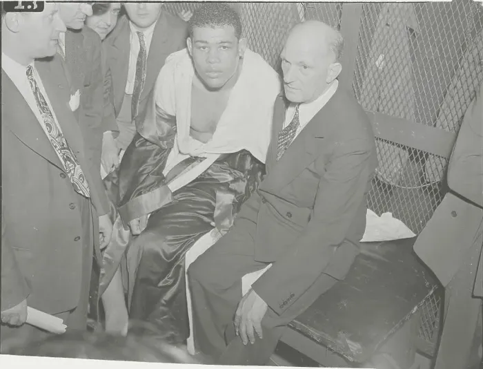 Framed Print : Boxing Champion Joe Louis with Official After Winning Match Framed Print : Boxing Champion Joe Louis with Official After Winning Match