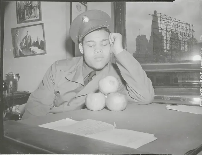 Framed Print : Boxing Champion Joe Louis Relaxing as a Soldier with Apple Display Framed Print : Boxing Champion Joe Louis Relaxing as a Soldier with Apple Display