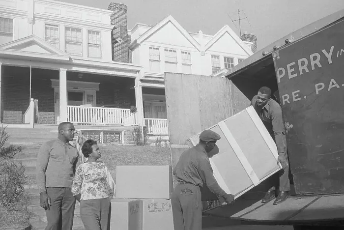 Framed Print : Boxing Champion Sonny Liston and Wife Guiding Movers at Van Framed Print : Boxing Champion Sonny Liston and Wife Guiding Movers at Van