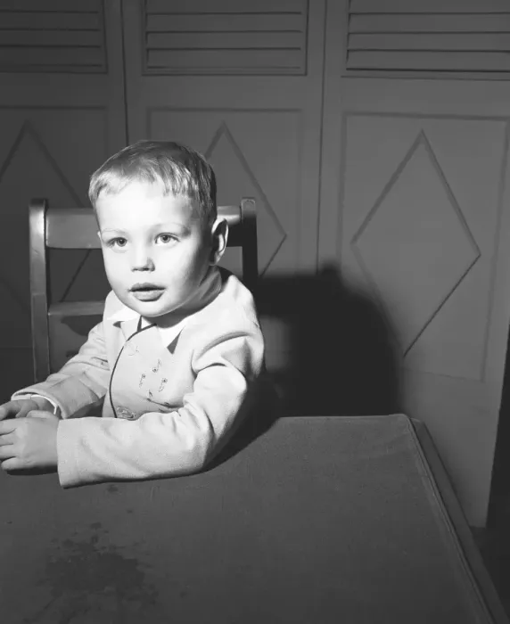 Framed Print : Boy (3-4) sitting at table, (B&W), portrait Framed Print : Boy (3-4) sitting at table, (B&W), portrait