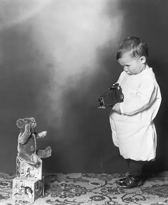 Framed Print : Boy Aiming Camera At His Teddy Bear