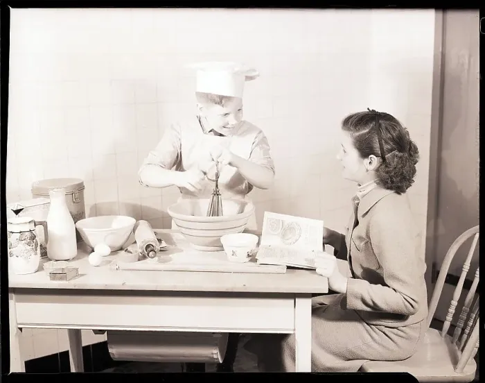 Framed Print : Boy Baking with His Mother