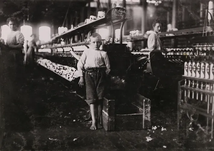 Framed Print : Boy Bashfully Posing in Yarn factory Framed Print : Boy Bashfully Posing in Yarn factory