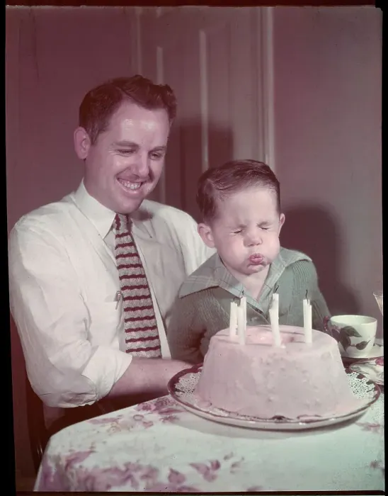 Framed Print : Boy Blowing Out Birthday Candles Framed Print : Boy Blowing Out Birthday Candles