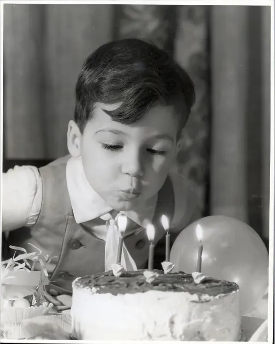 Framed Print : Boy Blowing Out Birthday Candles Framed Print : Boy Blowing Out Birthday Candles