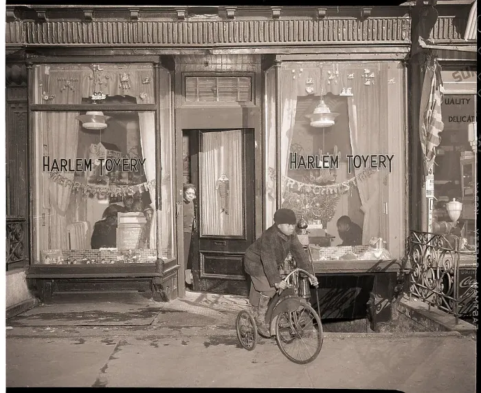 Framed Print : Boy Borrowing Tricycle from Toy Library