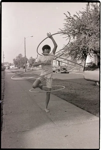 Boy Demonstrates Hula Hoop Technique Print, 1970. Art Prints
