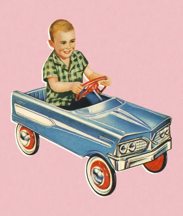 Framed Print : Boy Driving a Kiddie Car Framed Print : Boy Driving a Kiddie Car