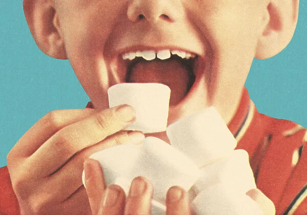 Boy Eating Marshmellows