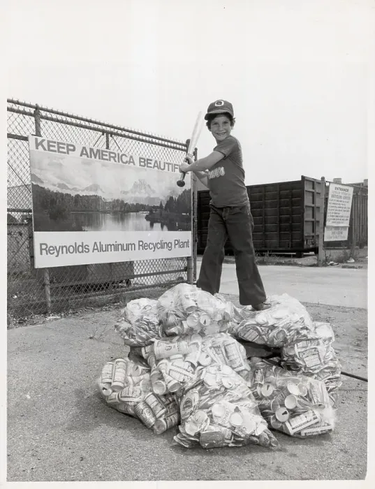 Framed Print : Boy Exchanges Aluminum Cans for Bats