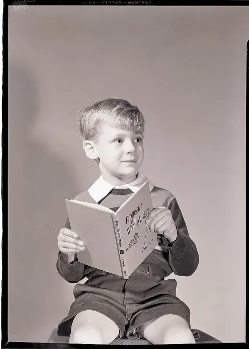 Framed Print : Boy Holding Book Framed Print : Boy Holding Book