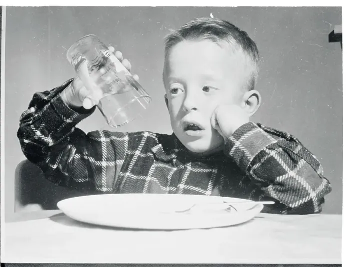 Framed Print : Boy Holding an Empty Glass Framed Print : Boy Holding an Empty Glass