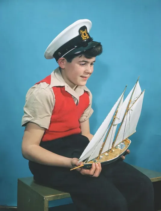 Framed Print : Boy Holding Model Sailboat Framed Print : Boy Holding Model Sailboat