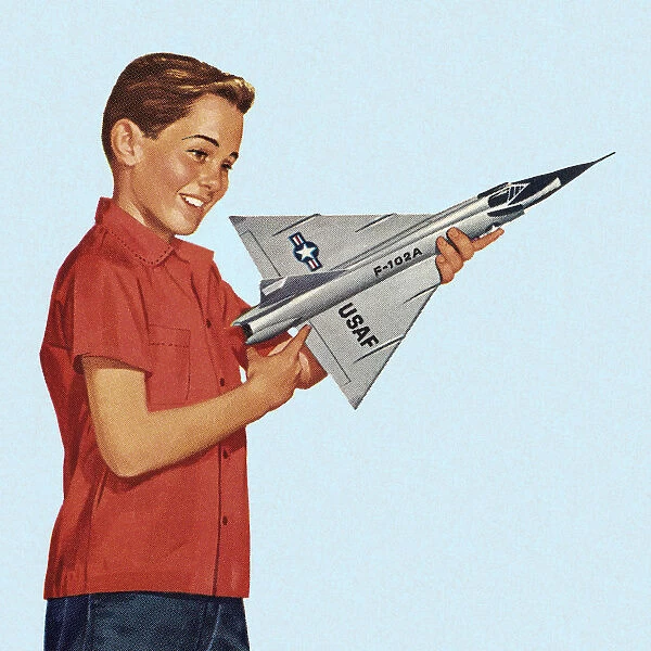 Boy Holding Toy Airplane