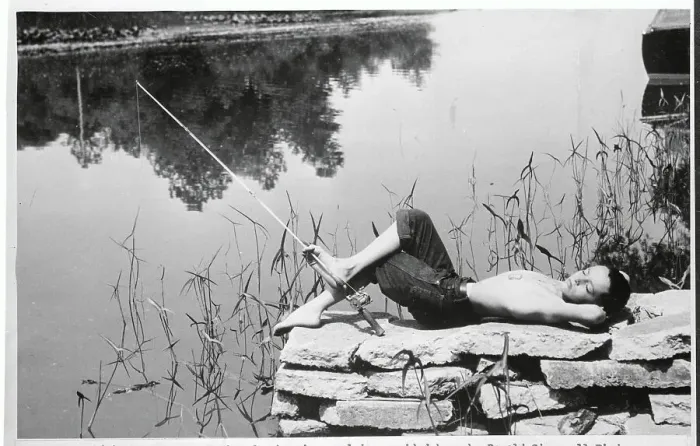 Framed Print : Boy Laying on Rocks While Fishing Framed Print : Boy Laying on Rocks While Fishing