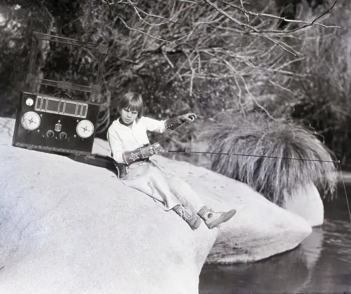 Framed Print : Boy Listening To Radio, Reeling In Trout Framed Print : Boy Listening To Radio, Reeling In Trout