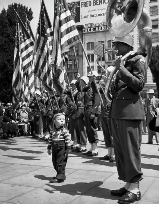 Framed Print : Boy Listening To Tuba Player