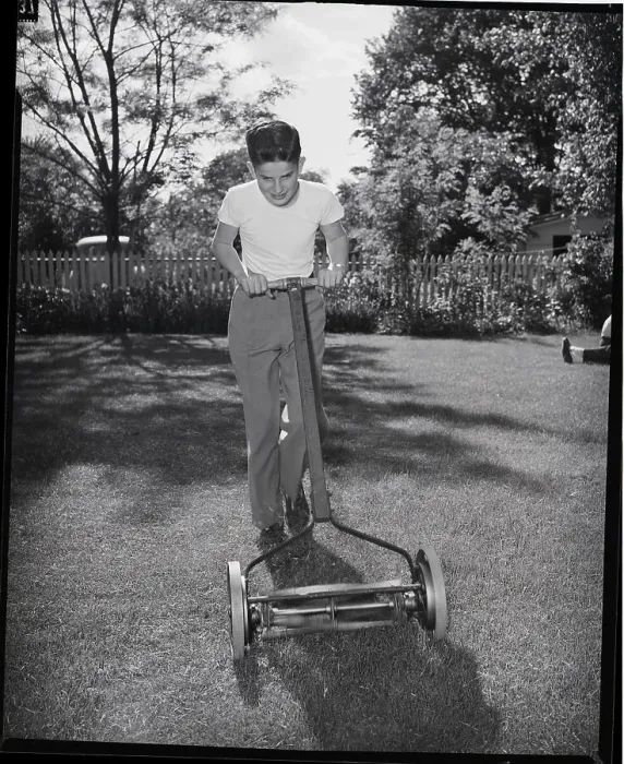 Framed Print : Boy Mowing Lawn Framed Print : Boy Mowing Lawn