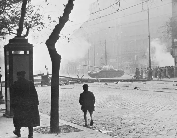 Framed Print : Boy and Pedestrian Near Military Tanks Framed Print : Boy and Pedestrian Near Military Tanks