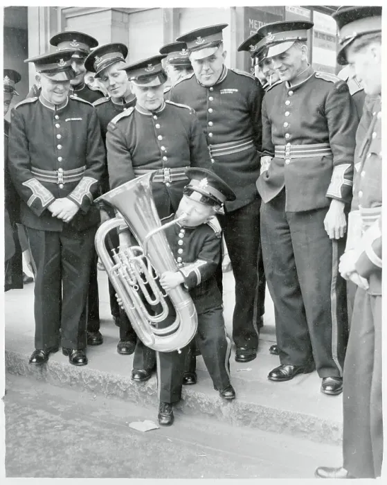 Framed Print : Boy Playing a Brass Instrument Framed Print : Boy Playing a Brass Instrument
