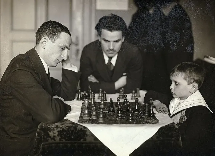 Framed Print : Boy Playing Chess Vs Man / Man Watches Framed Print : Boy Playing Chess Vs Man / Man Watches