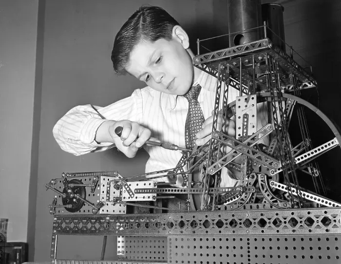 Framed Print : Boy Playing with Mechanical Set Framed Print : Boy Playing with Mechanical Set