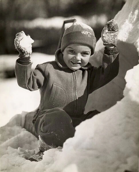 Boy playing in snow