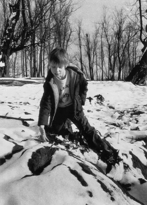 Framed Print : Boy Pointing out Mound in the Snow Framed Print : Boy Pointing out Mound in the Snow