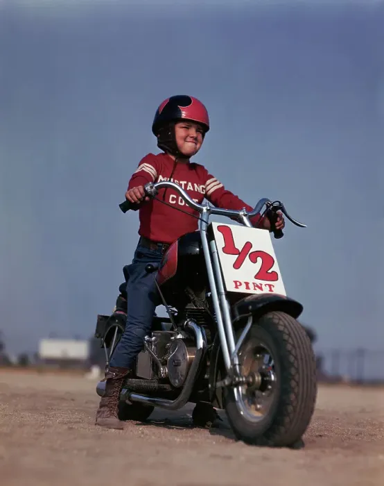 Framed Print : Boy Posing On Motorcycle Framed Print : Boy Posing On Motorcycle