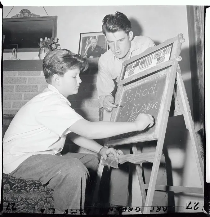 Framed Print : Boy Receiving Lessons from Adoptive Father
