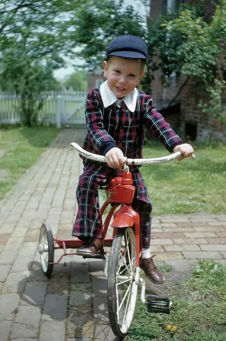 Framed Print : Boy Rides A Red Tricycle Framed Print : Boy Rides A Red Tricycle