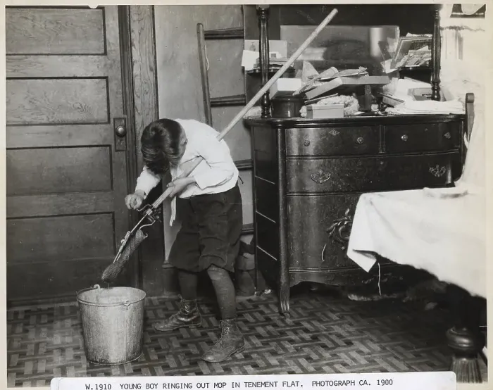 Framed Print : Boy Ringing Out Mop In Tenement Framed Print : Boy Ringing Out Mop In Tenement