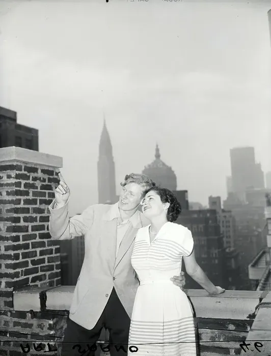 Framed Print : Boy Showing Girl Sights Atop Hotel Framed Print : Boy Showing Girl Sights Atop Hotel