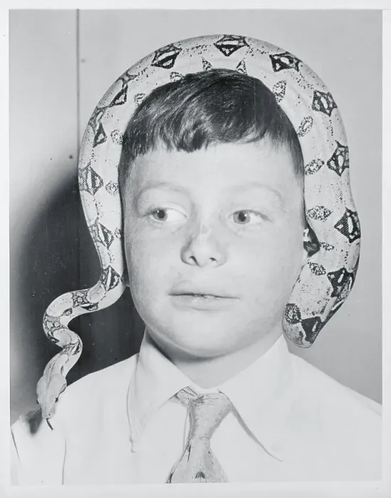 Framed Print : Boy With Snake on Head Framed Print : Boy With Snake on Head