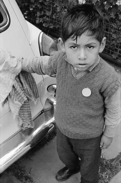 Framed Print : Boy Standing by Car Framed Print : Boy Standing by Car