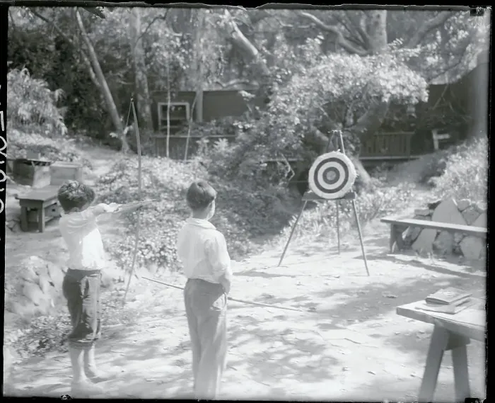 Framed Print : Boy Taking Aim with Bow and Arrow Framed Print : Boy Taking Aim with Bow and Arrow