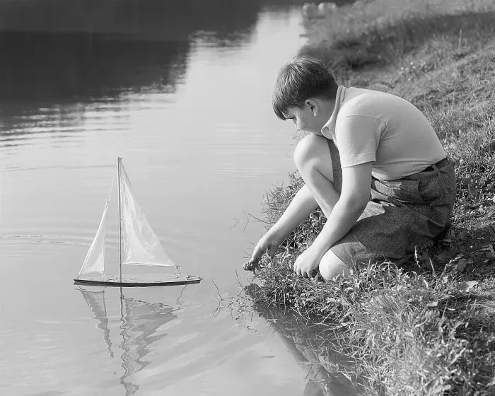 Framed Print : Boy and Toy Boat Framed Print : Boy and Toy Boat