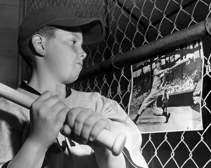 Framed Print : Boy W / Bat Looks At Photo Of Joe Dimaggio Framed Print : Boy W / Bat Looks At Photo Of Joe Dimaggio