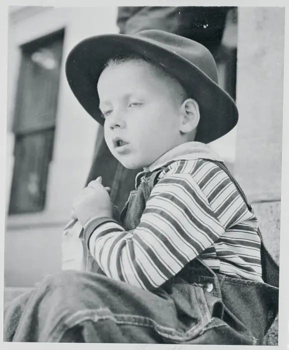 Framed Print : Boy Wearing Hat and Eating Treat Framed Print : Boy Wearing Hat and Eating Treat