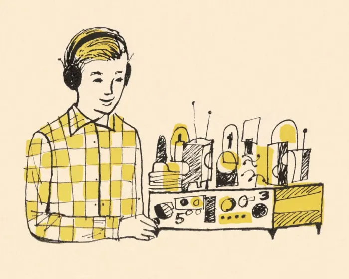 Framed Print : Boy Wearing Headphones and Using Radio Framed Print : Boy Wearing Headphones and Using Radio